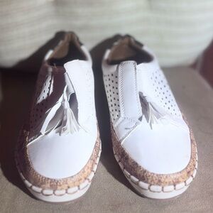 White Perforated Slip-On Shoes with Tassels